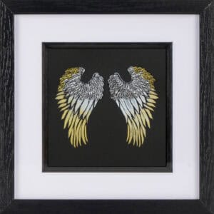 A paper quilled set of gold and silver angel wings on a black background.